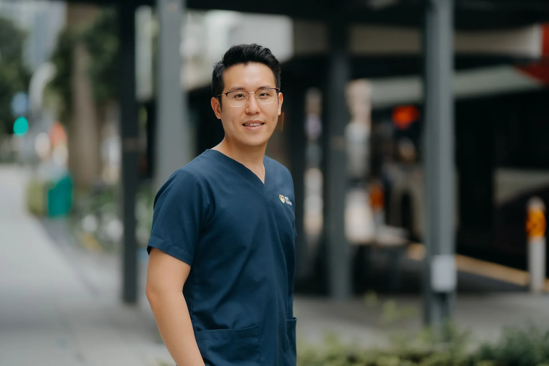 Dr Joel Foo, men's health doctor in Singapore, standing at his Jurong clinic