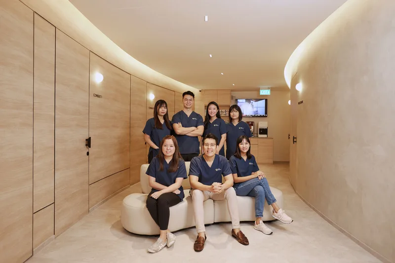 Dr Joel Foo with the health-screening team at the Jurong clinic — administering adult MMR vaccinations in Singapore